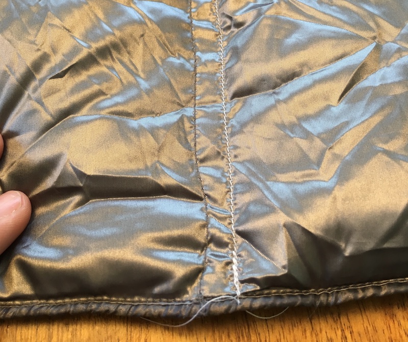Vertical seam stitched to allow for removal of side panel.